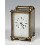 Carriage clock; second half of the 19th century.Bronze, glass and brass.The glass is missing.Needs