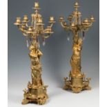 Pair of candlesticks; France, second half of the 19th century.Gilt bronze and Baccarat glass.