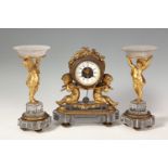 Harness. France, S. XIXTable clock in glass and mercury-gilt bronze.It presents small faults in