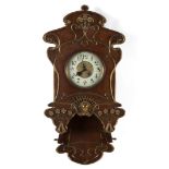 Jugendstil Lenzkirch Uhrenfabrik wall clock. Germany, ca. 1890.Walnut wood and gilt metal.With