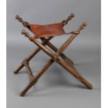 Faldistorio or scissor chair. 17th century.Walnut wood.Leather seat.Measurements: 72 x 62 x 74 cm.