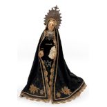 Dress carving or capipota of the Virgen Dolorosa. Andalusia, 19th century.Carved and polychrome