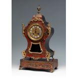 Boulle style clock; France, Napoleon III period, second half of the 19th century.Bronze and ebonised