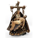 Dress carving or capipota of the Pietà. Cordovan school, 19th century.Carved and polychrome wood.