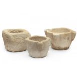 Set of three stone mortars.Spain, late 17th - early 18th century.Sizes: 15 x 22 x 28 cm, 16 x 26 x