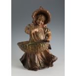 ESTEVA y CIA. Publishers. Ca. 1900."Girl with basket".Polychrome terracotta sculpture.With Esteva