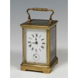 Carriage clock; France, second half of the 19th century.Bronze, brass and glass.No bell.