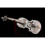 Violin; Marseilles School; second half of the 18th century.Enamelled ceramic.Measurements: 58 x 19 x