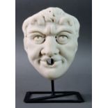 Roman or Florentine school of the 17th century.Grotesque mask with fountain mouth.White marble.The