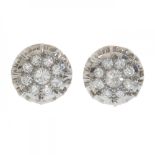 Pair of rosette earrings in 18kt yellow gold and platinum frontis. With diamonds, brilliant cut, the