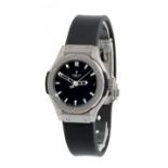 HUBLOT watch ref.1028899, for woman. In steel and titanium. Black dial with sword type hands and