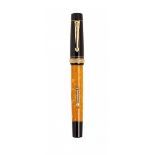 DELTA "DOLCE VITA" FOUNTAIN PEN, 1996.Black and orange resin barrel with gold details.Two-tone 18