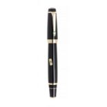 MONTBLANC "BOHEME VERDE" FOUNTAIN PEN.Barrel made of black resin with yellow gold and green stone