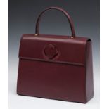 CARTIERLeather bag.Bag made of burgundy Cartier Vintage leather, with a round handle at the top that