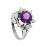 Ring in 18kt white gold. Model rosette with rhodolite garnet, round cut, weight ca. 0.30 cts.,
