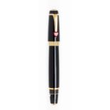 MONTBLANC "BOHEME HEART RUBY" FOUNTAIN PEN.Barrel made of black resin and details in yellow gold and