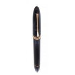 OMAS "360" FOUNTAIN PEN.Barrel in transparent black celluloid and details in rose gold.Limited