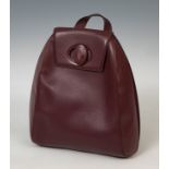 CARTIERLeather backpack.Backpack made of maroon-colored leather from the Cartier firm. The piece has