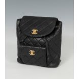 CHANEL.Dune model backpack, 1997.Leather and metal appliqués.Chanel signature backpack made of