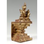 Figure of Nat, Burma.Carved, lacquered and gilded wood.Measurements: 33 x 13 x 13 cm.Burmese