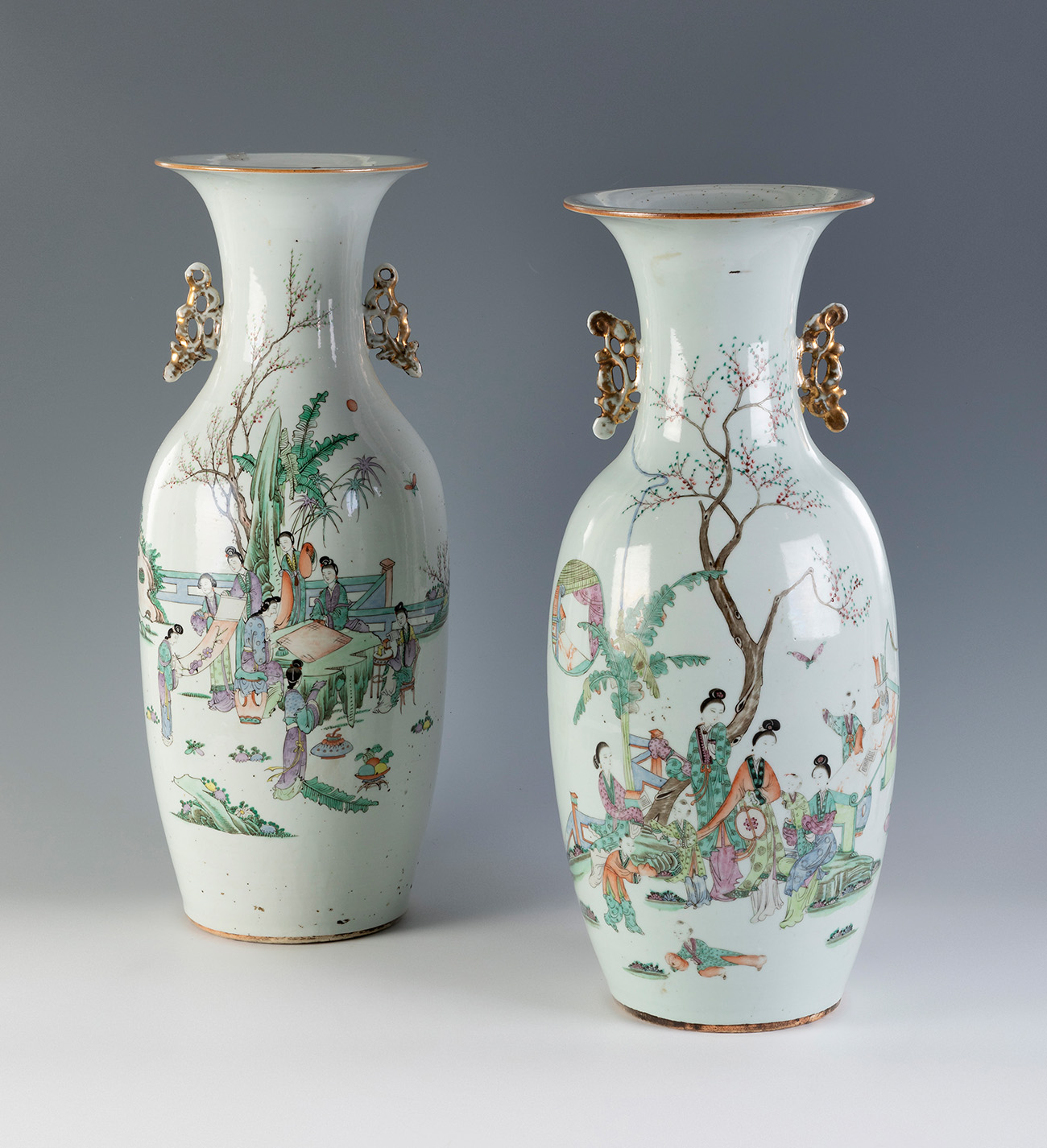 Pair of vases. China, Qing dynasty. Green family, 19th century.Hand-painted porcelain.Signed on
