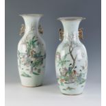 Pair of vases. China, Qing dynasty. Green family, 19th century.Hand-painted porcelain.Signed on
