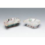 Pair of small leaf-shaped fountains. China, late 19th century.Enamelled porcelain.Stamps on the