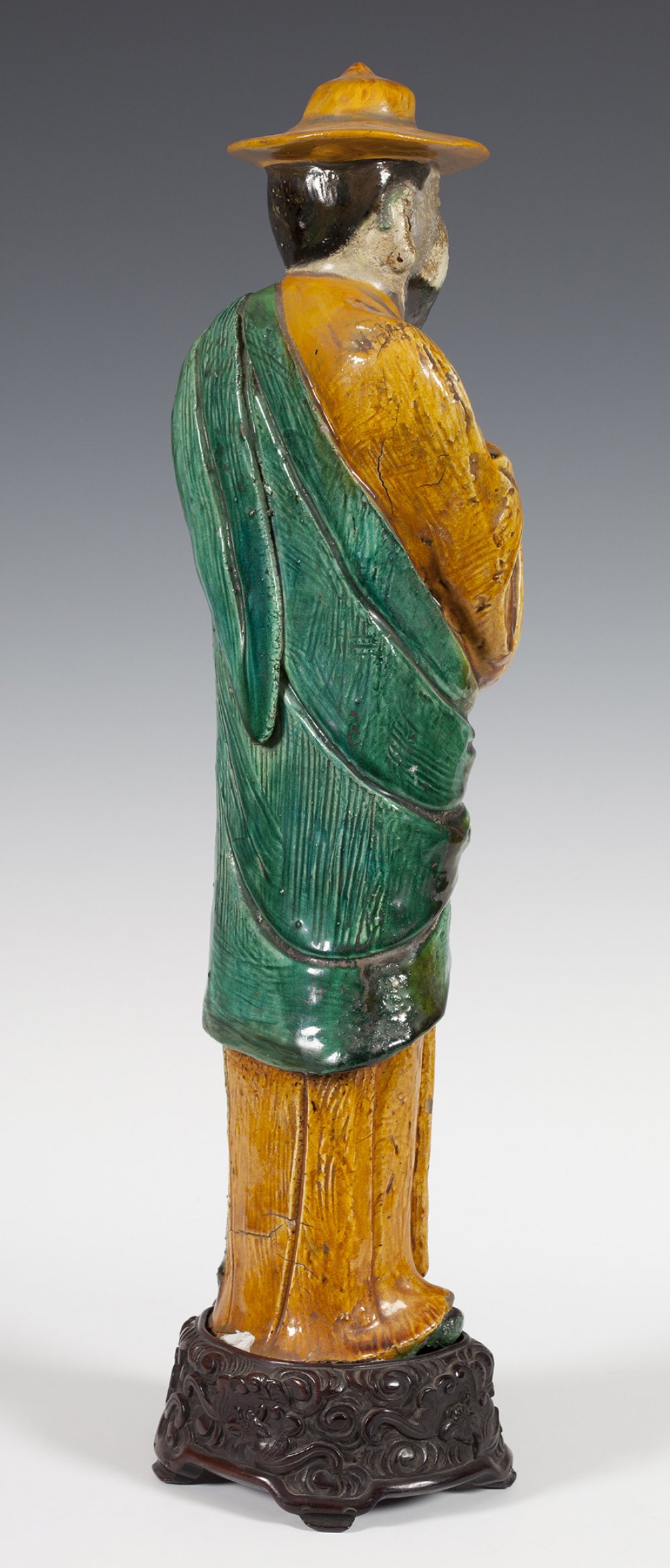 Figure of a monk. China, early 19th century.Stoneware and carved wooden base.Measurements: 51 x 14 x - Image 2 of 3