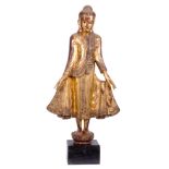 Burmese school, early 20th century."Buddha".Lacquered wood, gilded and with mirrored glass