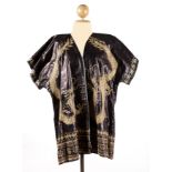 Hmong ceremonial jacket; Yunnan, China.Silk beaten and dyed with cow's blood and embroidered with