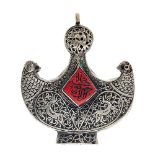 Oriental style metal and silver pendant symmetrically arranged with a half-moon structure with the