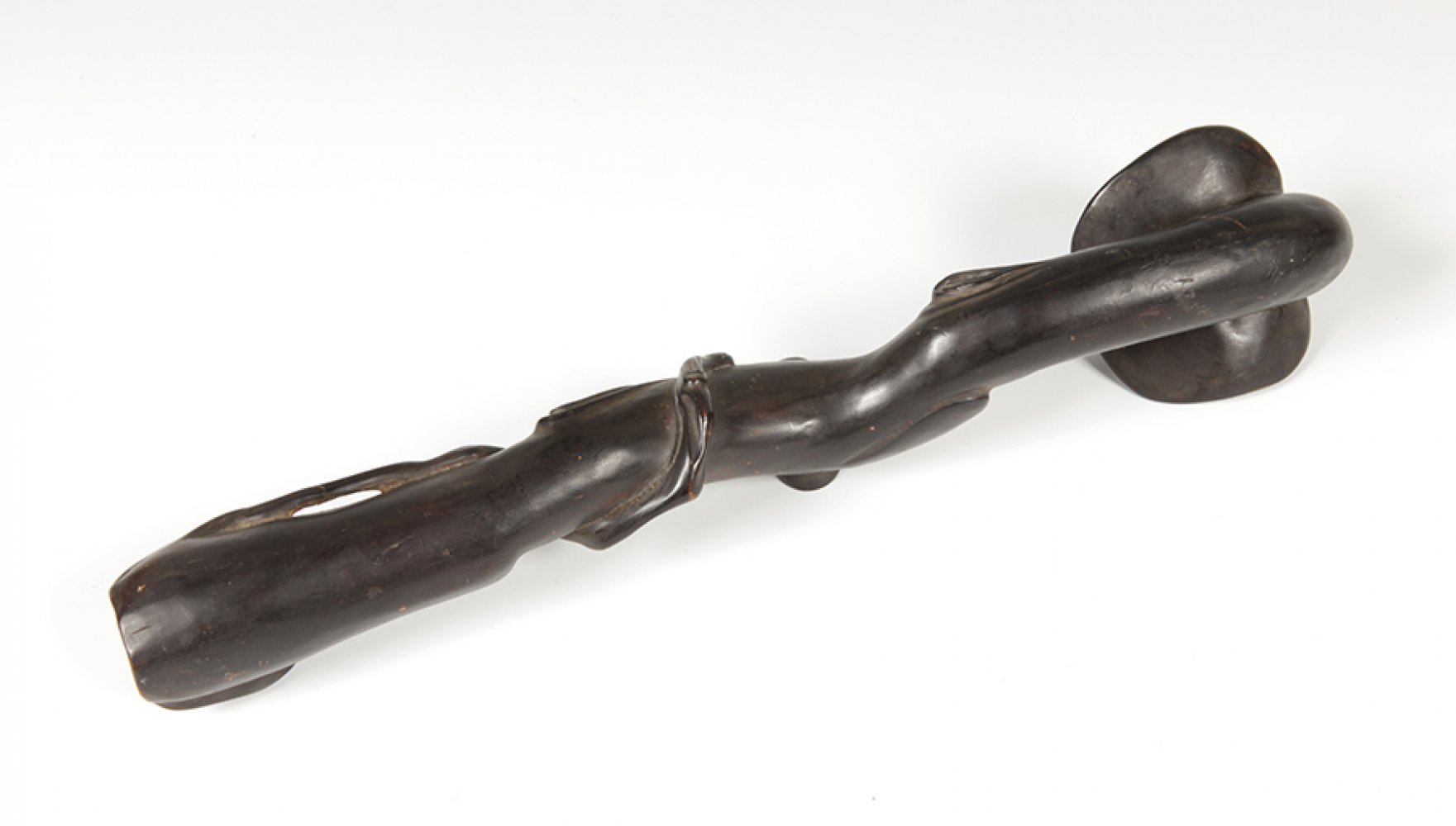 Ruyi sceptre; Liaoning, China, 19th century.Carved wood.Measurements: 37 cm long.This type of - Image 3 of 3