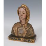 Reliquary bust of Saint Cecilia; Renaissance school; 16th century.Carved and polychromed wood.It