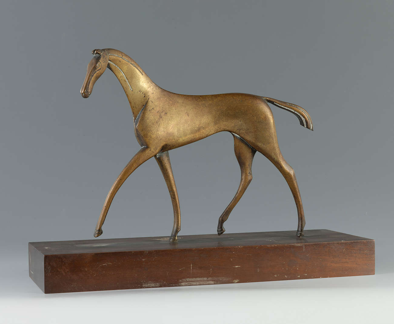 KARL HAGENAUER (Austria, 1898 - 1956)."Horse".Sculpture in darkened brass. Wooden base.The base is