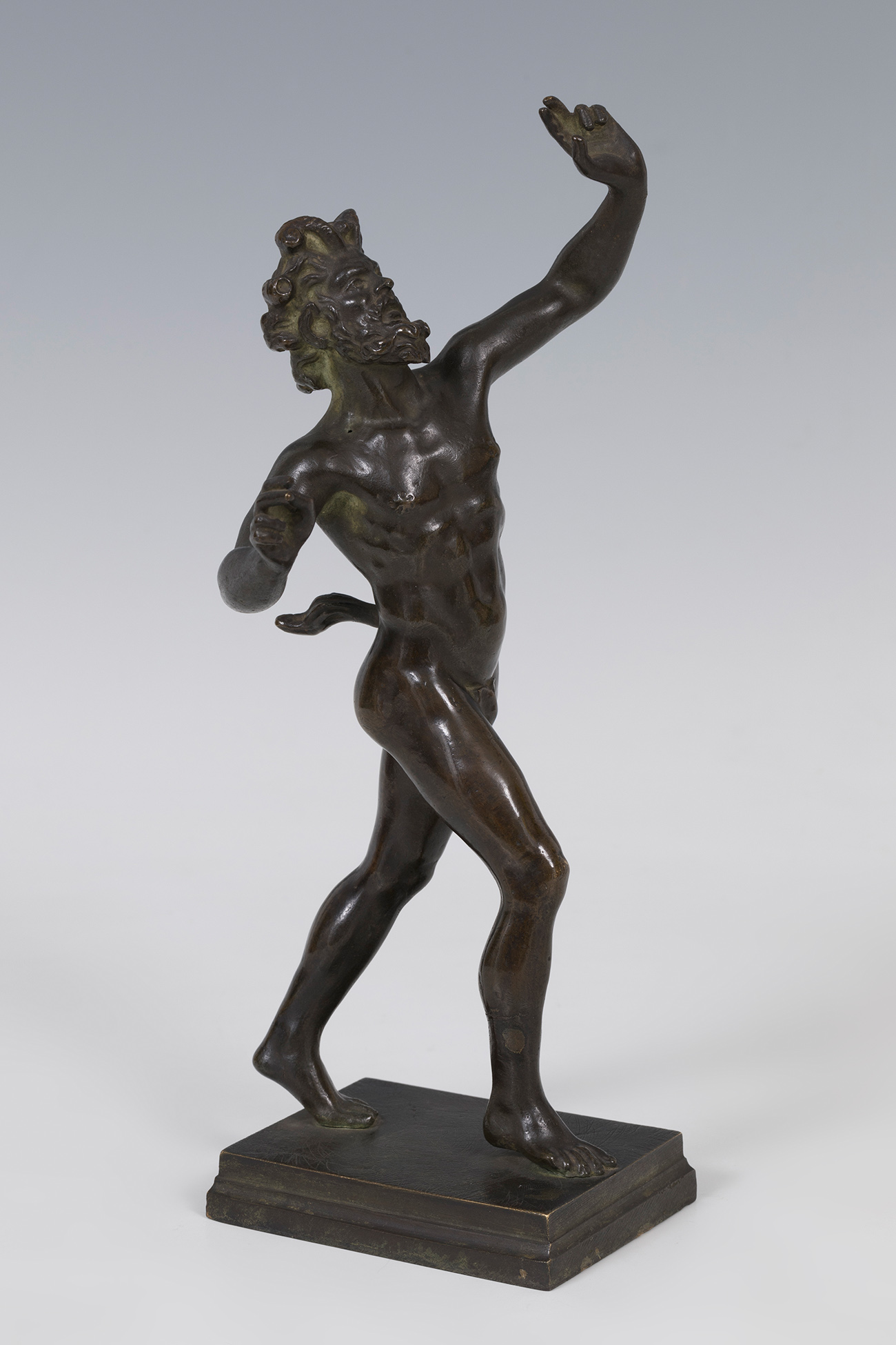 Following Roman models; Italy, late 19th century."The dancing faun".Blued bronze.Measurements: 25,