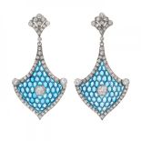 Pair of long earrings with movement in 18k white gold. Two-piece model, with magnificent pliqué