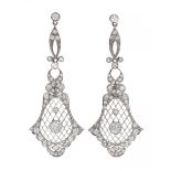 Pair of long earrings with movement, in platinum. and brilliant-cut diamonds weighing ca. 2.00