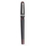 MARLEN FOUNTAIN PEN "MACCVS: DOSSENUS".Maroon and black ebonite barrel and silver details.Limited