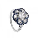 Ring in platinum, diamonds and sapphires. Rosette model, flower-shaped, with brilliant-cut diamonds,