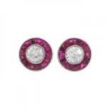 Pair of earrings in 18k white gold, diamonds and rubies. Partridge eye model, with brilliant-cut