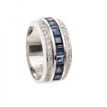 Ring made in 18 kt white gold, with natural sapphires weighing 1 ct., And 44 diamonds, brilliant