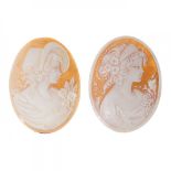 Pair of cameos. Oval agate plaques with images of two ladies in profile.Measurements. 45,6 x 33,5