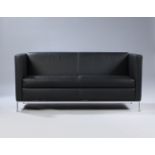NORMAN FOSTER (UK, 1935) for KNOLL.Two-seater sofa model 501 "Congress".Steel legs and black leather