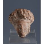 Head. Smyrna, 3rd century BC.Terracotta.Provenance: Smyrna, 1895-1905. Collection Paul Gaudin (Paris