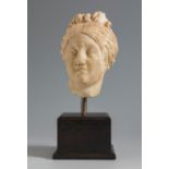 Head of the goddess Venus. Rome, 2nd century AD.Marble.Provenance: private collection of Nancy and