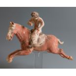 Female polo player. China, Tang dynasty, AD 618-906.Terracotta and pigments.Thermoluminescence