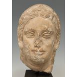 Female bust; Cyprus, 5th-4th century BC.Limestone.It has material losses on the chin and nose.