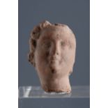 Female head. Smyrna, 3rd century BC.Terracotta.Provenance: Smyrna, 1895-1905. Collection Paul Gaudin