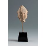 Head of Eros. Smyrna, 3rd century BC. Terracotta.