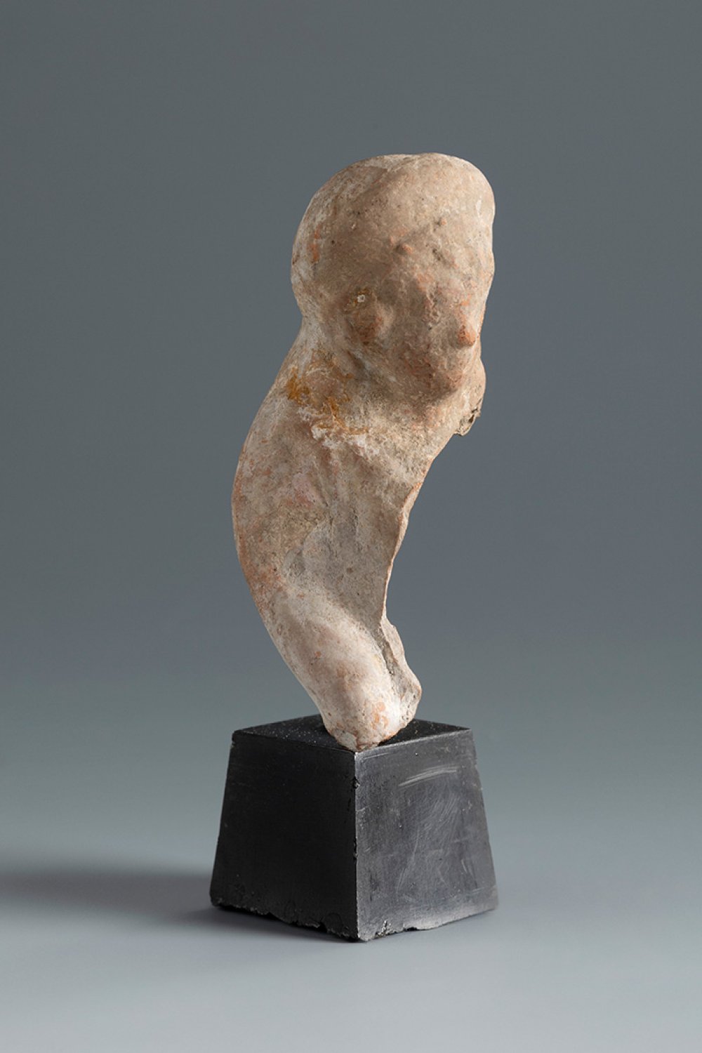 Bust of a young man. Smyrna, 4th-3rd century BC.Terracotta.Provenance: Smyrna, 1895-1905. Collection